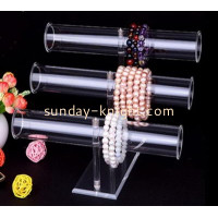 What caused the difference price in the custom plexiglass display processing?