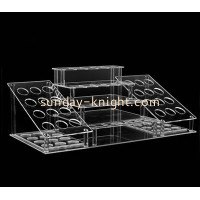 What are the uses of plexiglass display stands?