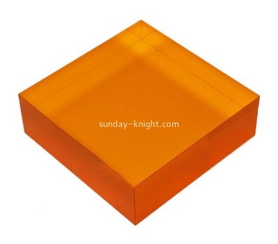 Custom orange lucite display block ABK-101